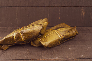 Tamal Typical Colombian Food Wrapped in Banana Leaves