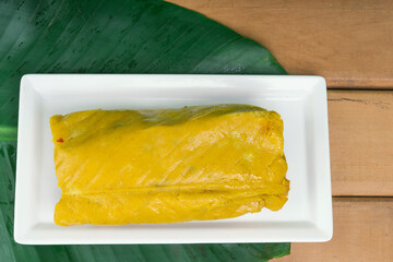 Tamal Typical Colombian Food Wrapped in Banana Leaves