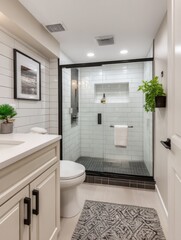 Contemporary bathroom interior showcasing shower with glass door toilet vanity and stylish rug neutral color palette