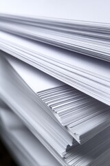 Obraz premium Stack of White Printer Paper Close Up Abstract View from Above for Business and Office Use in Studio