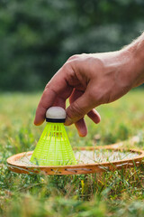 Wooden badminton rackets and shuttlecocks soft focus concept. Copy space Summer outdoor activities. Staycation leisure time