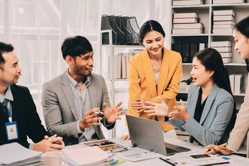 Team of financial advisory services. Asian advisor showing plan of investment to clients in the consultancy office..