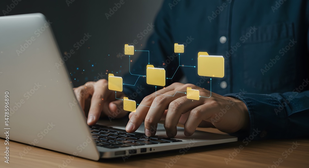 Poster person typing on a laptop with digital folders connecting in a network visualization above them