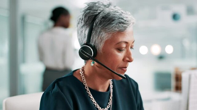 Headset, contact center and mature woman chat for communication, lead generation or insurance. Sales, telemarketing and consultant in conversation for outbound marketing, call or feedback in office