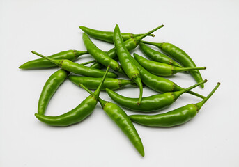 Fresh Green Chilies on White Background – Spicy Ingredient for Cooking

