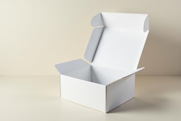 A pristine white cardboard box, opened slightly, rests on a neutral backdrop, presenting a minimalist yet versatile image ideal for various design projects requiring a clean and simple aesthetic.