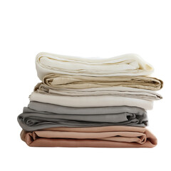 A stack of neatly folded bed sheets of different colors