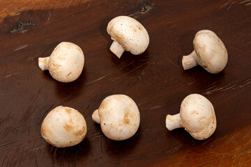 Fresh Mushrooms on a Rustic Wooden Table