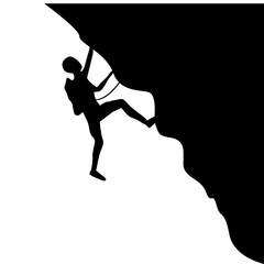 silhouette of people rock climbing