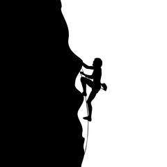 silhouette of people rock climbing