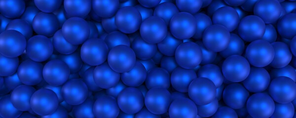 Close-up view of a multitude of vibrant blue spheres with a subtle sheen, creating a dense and rich abstract background