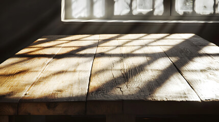 Sunlight casting shadows on a wooden table evening light photography indoor close-up natural ambiance