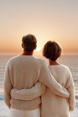 Fototapeta premium A couple embraces while watching a serene sunset over the ocean, enjoying a peaceful and intimate moment together.