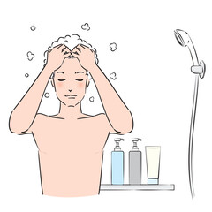 シャンプーを泡だてしっかり洗髪する男性