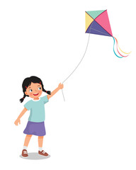 Little girl playing kite outside