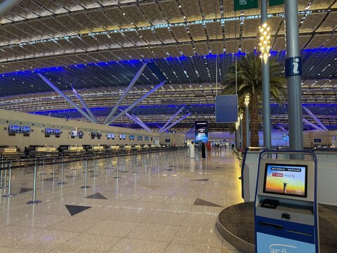 Jeddah , Saudi Arabia - May 12 2025 : Passengers traveling through King Abdulaziz International Airport - flight  and booking concept