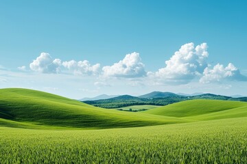 Obraz premium Picturesque green hills rolling under blue sky with clouds in summer
