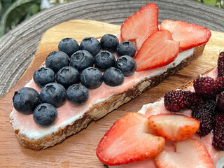 strawberry, blueberry and mulberry Pink rose yoghurt toast.
