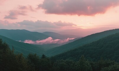 Misty mountain range at sunset.  Soft hues of pink and purple paint the sky above layered mountain ranges.  A veil of clouds drifts through the valleys. Lush green forests cling to the slopes