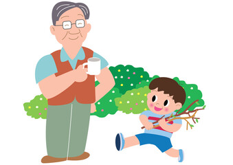 キャンプでコーヒーカップを持つお父さんと男の子
