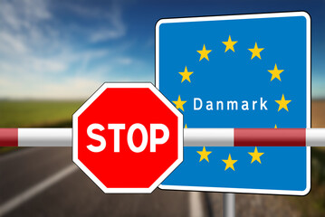Denmark sign and a barrier at the border