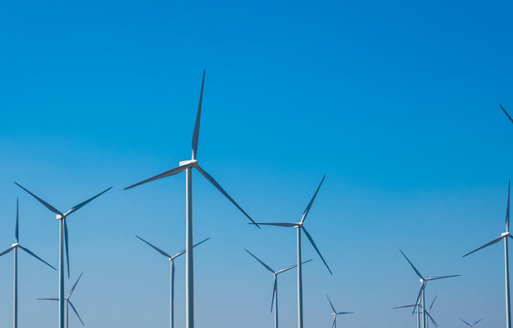 Wind farm on the mountain on blue sky day wind energy concept alternative energy Renewable energy