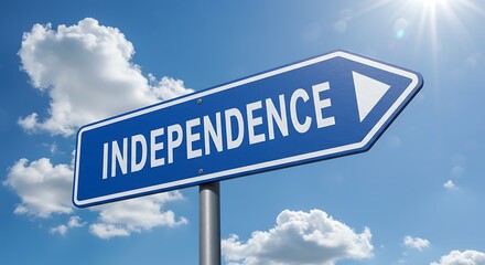 Obraz premium Blue sign points towards Independence under a bright blue sky.