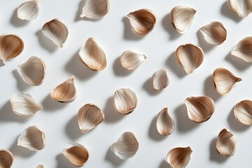 Delicate garlic peels scattered, creating a  pattern