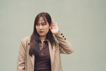 portrait of a young woman listening  something