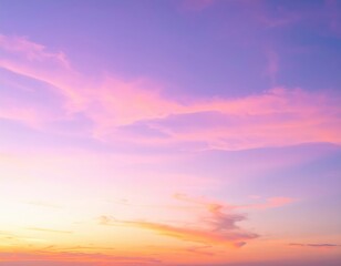 Fototapeta premium A vibrant blue sky stretches overhead, dotted with fluffy white clouds that drift lazily, creating a serene and uplifting atmosphere.