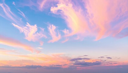 Naklejka premium A vibrant blue sky stretches overhead, dotted with fluffy white clouds, creating a serene backdrop that evokes a sense of calm and tranquility.