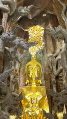 Golden Buddha Statue Inside Wat Maniwong Temple, Nakhon Nayok, Thailand – Sacred Interior Detail