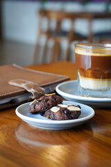 Chocolate almond cookies, captured on May 14, 2025. Crispy and rich cocoa cookies with chunks of roasted almonds, delivering a sweet and nutty flavor in every bite