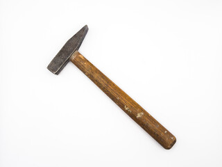 Old hammer with wooden handle isolated on white background. Flat lay. Top view, copy space.