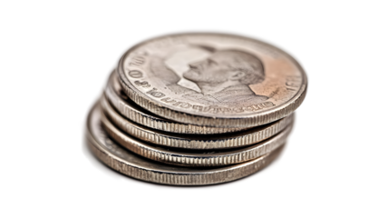 A stack of silver coins with a man on the front. The coins are piled on top of each other