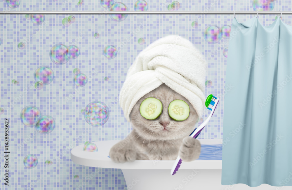 Aufkleber Cute tiny kitten with towel on it head and with slices of cucumber on it eyes holds toothbrush and takes the bath at home
