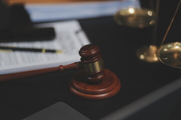 female business woman lawyers working at the law firms. Judge gavel with scales of justice. Legal...