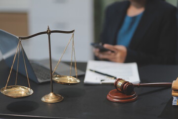 female business woman lawyers working at the law firms. Judge gavel with scales of justice. Legal...