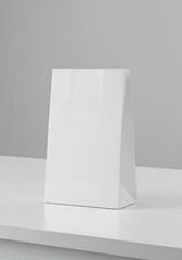 Blank White Paper Shopping Bag Mockup on a White Surface