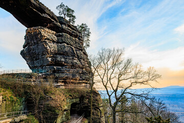 Fototapeta premium Majestic rock formation and scenic landscape at sunset