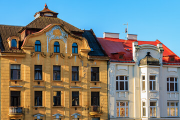 Fototapeta premium Historic european architecture with ornate facades and vibrant colors on a sunny day