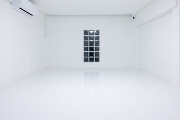 Empty room with square white tile floor texture pattern in perspective at night. Include glass block wall, air conditioner. Clean shiny surface reflection light. Modern interior suit for background.