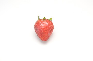 Close up view of strawberry harvest held in hand on white background. Concept of healthy food, vitamins, agriculture, market, sale of strawberries.