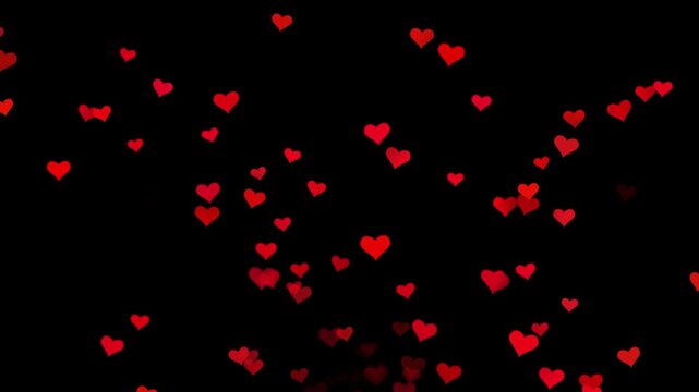 Red Heart icons floating up animation isolated on Black Background
