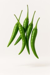 Fresh Green Chili Peppers on White Background