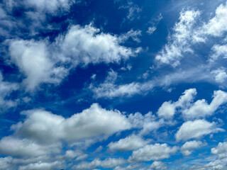 Obraz premium sky and white clouds. Beautiful blue sky clouds for background. Blue Sky with Fluffy White Clouds on a Sunny Summer Day.