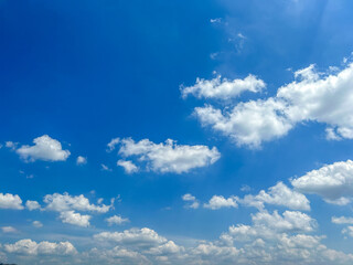 sky and white clouds. Beautiful blue sky clouds for background. Blue Sky with Fluffy White Clouds on a Sunny Summer Day.