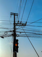 Traffic light poles contrast beautifully with the sky.