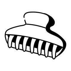 A doodle style icon showing claw clip  