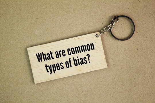 wooden tags with question words What are common types of bias?